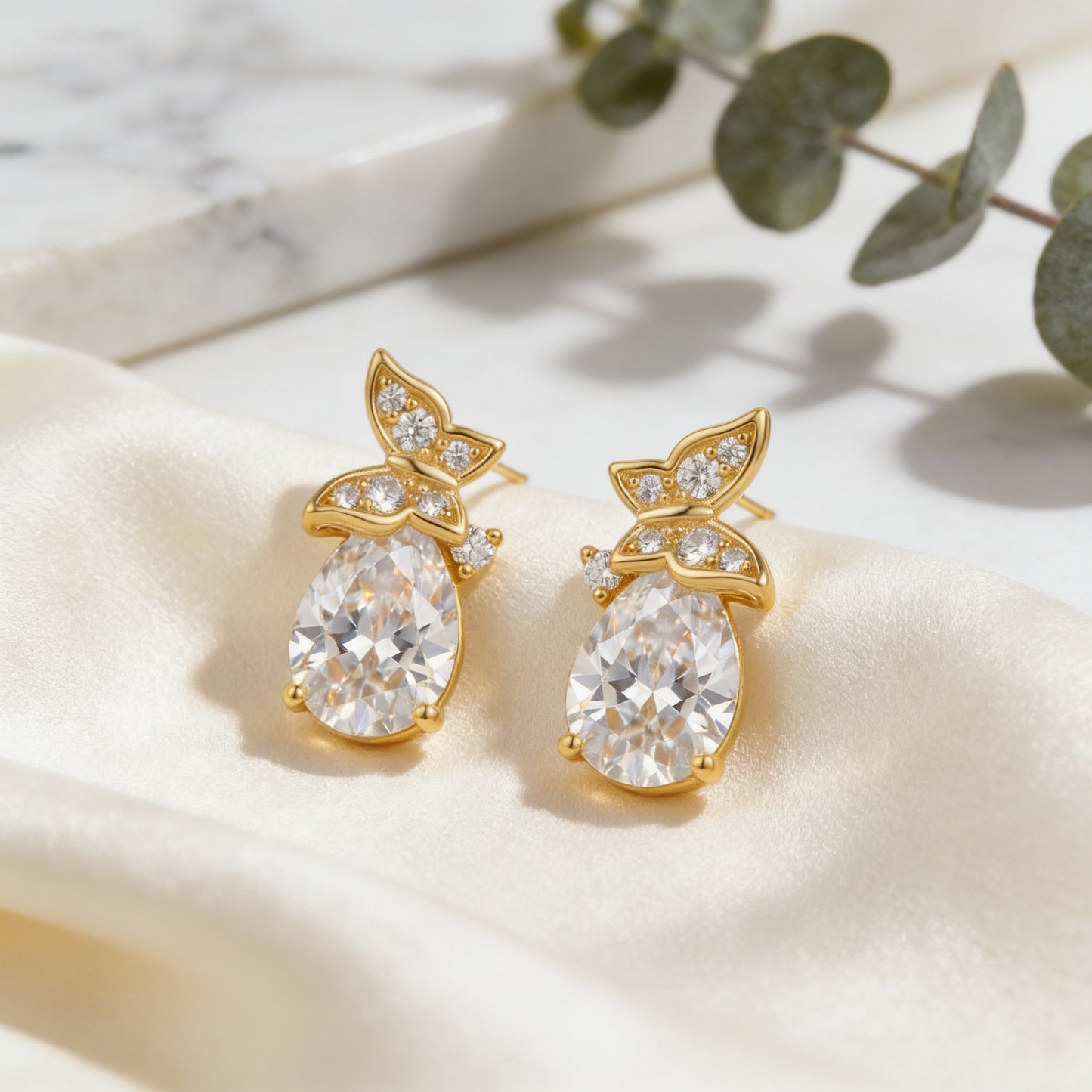 925 Sterling Silver Sparkling Pear-Shaped Cubic Zirconia Stud Earrings with Elegant Floral Accents